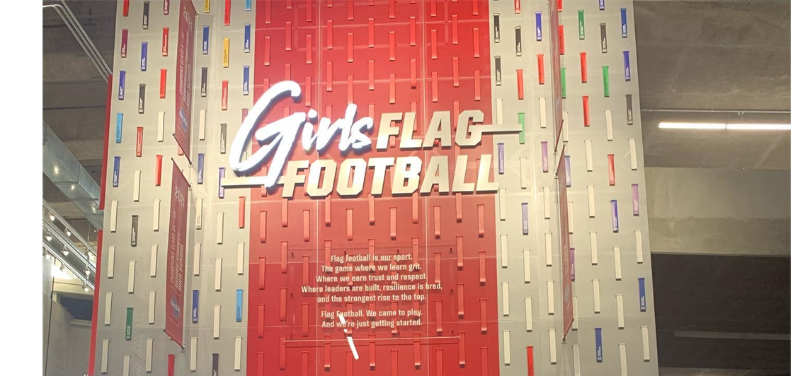 Atlanta Flacons support Girls NFL Flag with Wall at Stadium